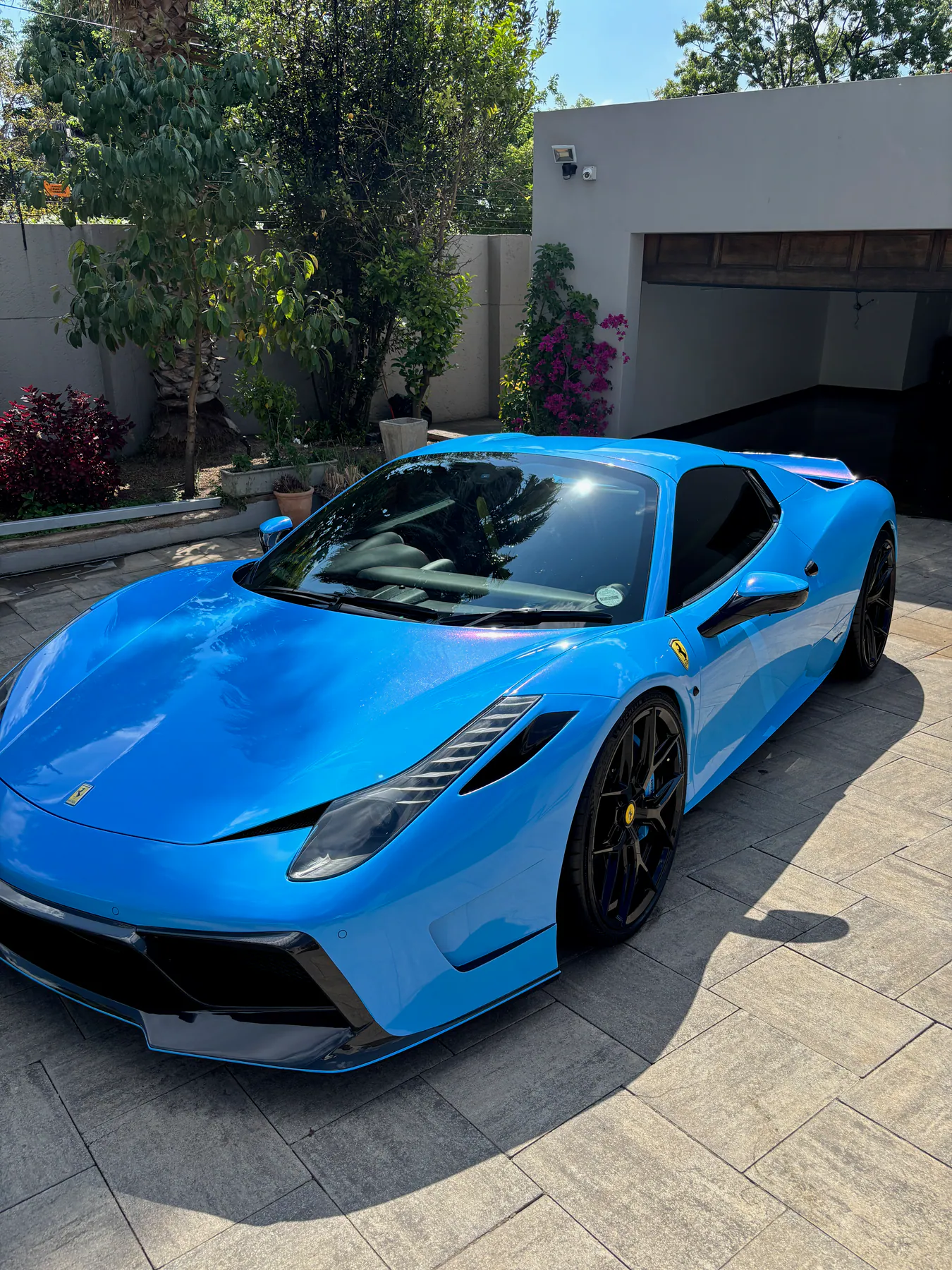 Blue Ferrari after premium detailing